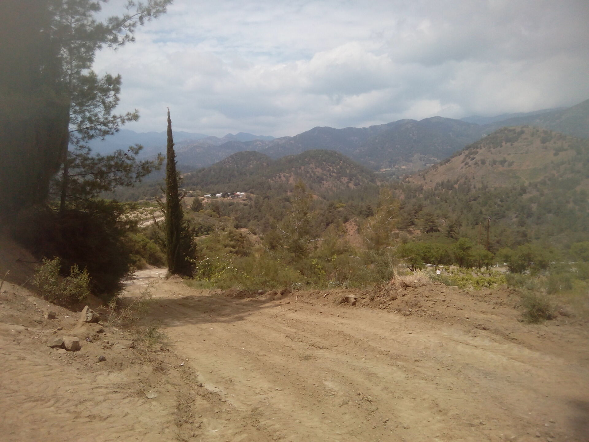 Land for sale near Paphos and Nicosia with scenic mountain views and rural surroundings. Ideal for b.