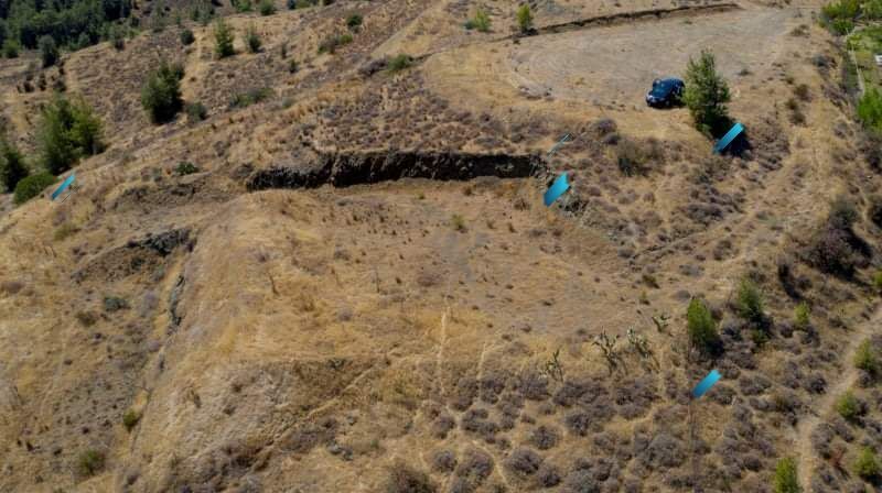 Aerial view of two land plots for sale in Cyprus near Paphos and Nicosia.