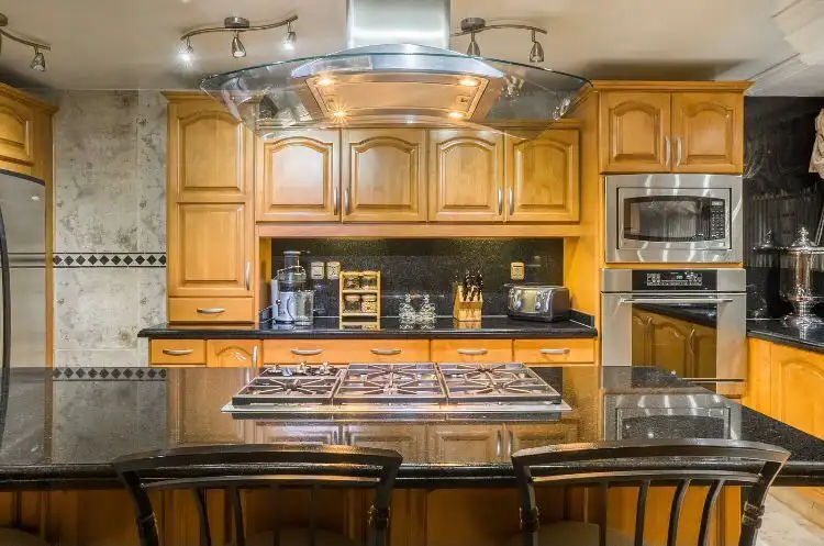 Luxury apartment kitchen with modern appliances in Mexico City.