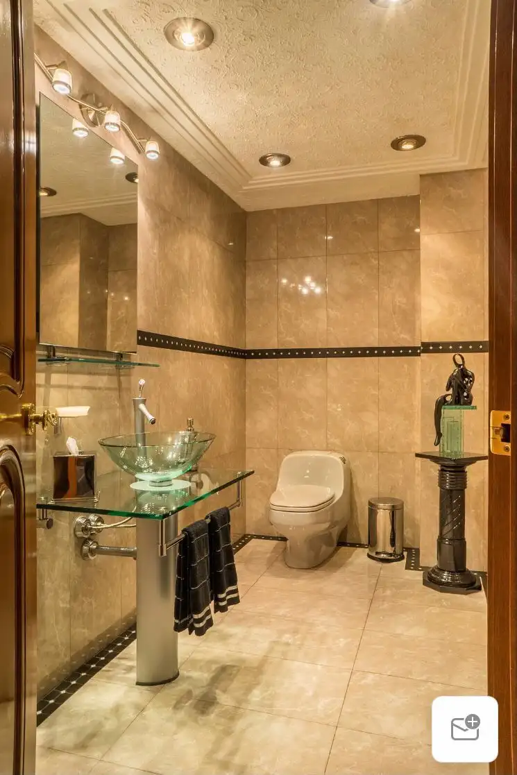 Elegant bathroom with modern fixtures and stylish decor in a luxury Mexico City apartment.