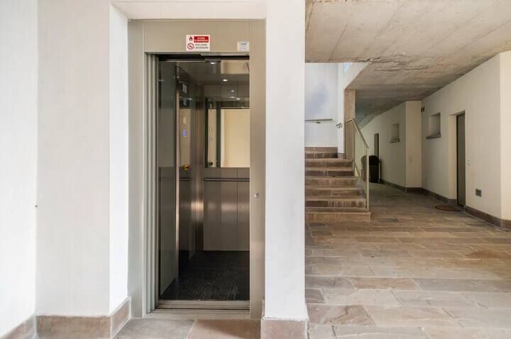Modern elevator in luxury duplex apartment building.