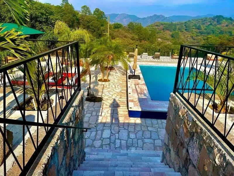 Style villa featuring a private pool and lush surroundings in La Trinidad. Perfect for peaceful livi.