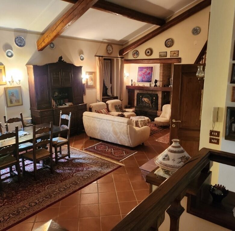Charming country villa interior with spacious living room, traditional decor, and cozy fireplace in.