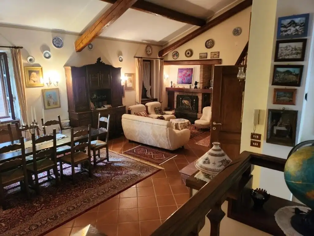 Charming country villa interior with spacious living room, traditional decor, and cozy fireplace in.
