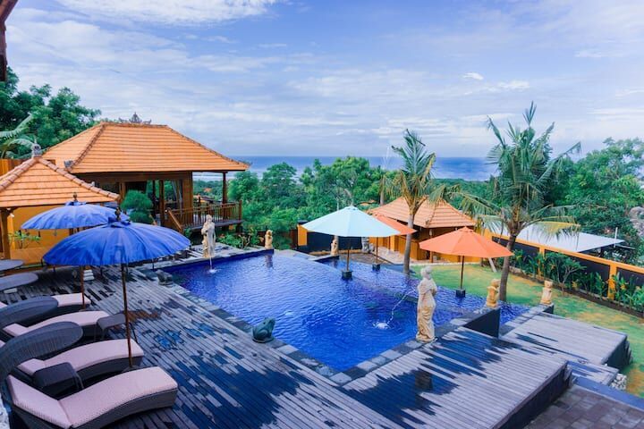 Hilltop Bali villa with infinity pool and ocean views.