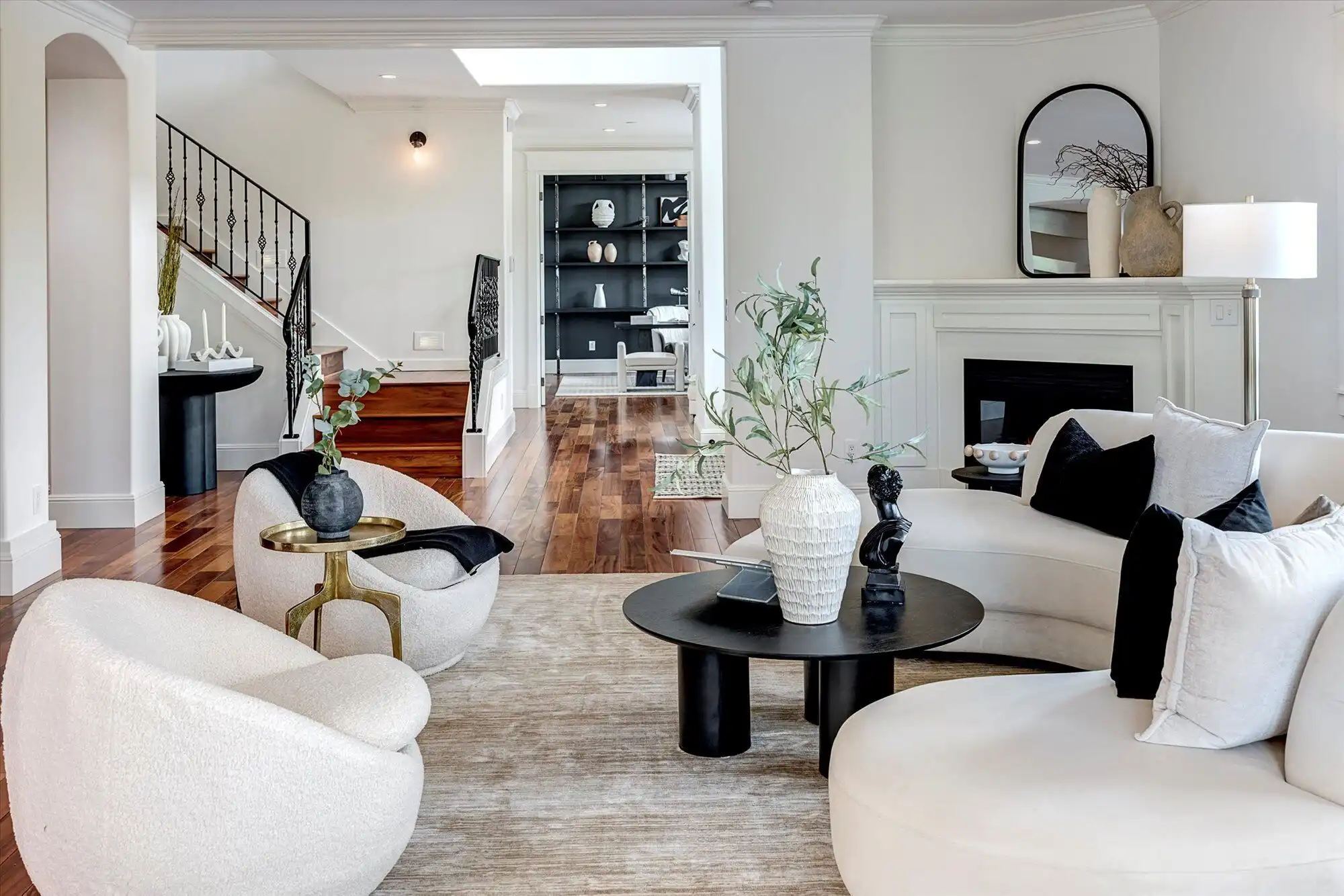 Elegant modern living room with stylish furniture and decor in a luxury home.