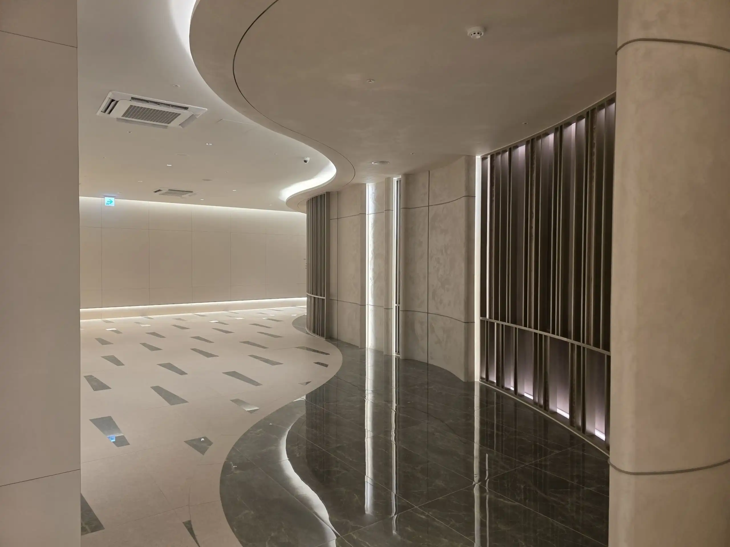 Luxurious apartment lobby with modern design and elegant lighting in Seoul, South Korea.