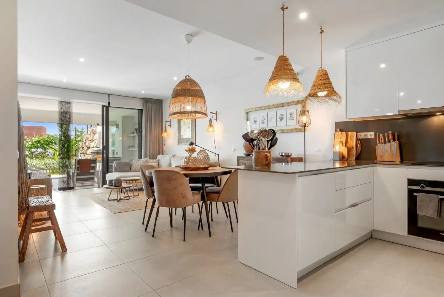 Bright and spacious ground-floor apartment with open-plan living and modern kitchen design.