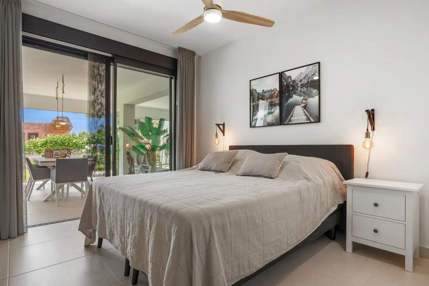Floor apartment featuring a spacious bedroom, balcony, and garden views in a contemporary setting.