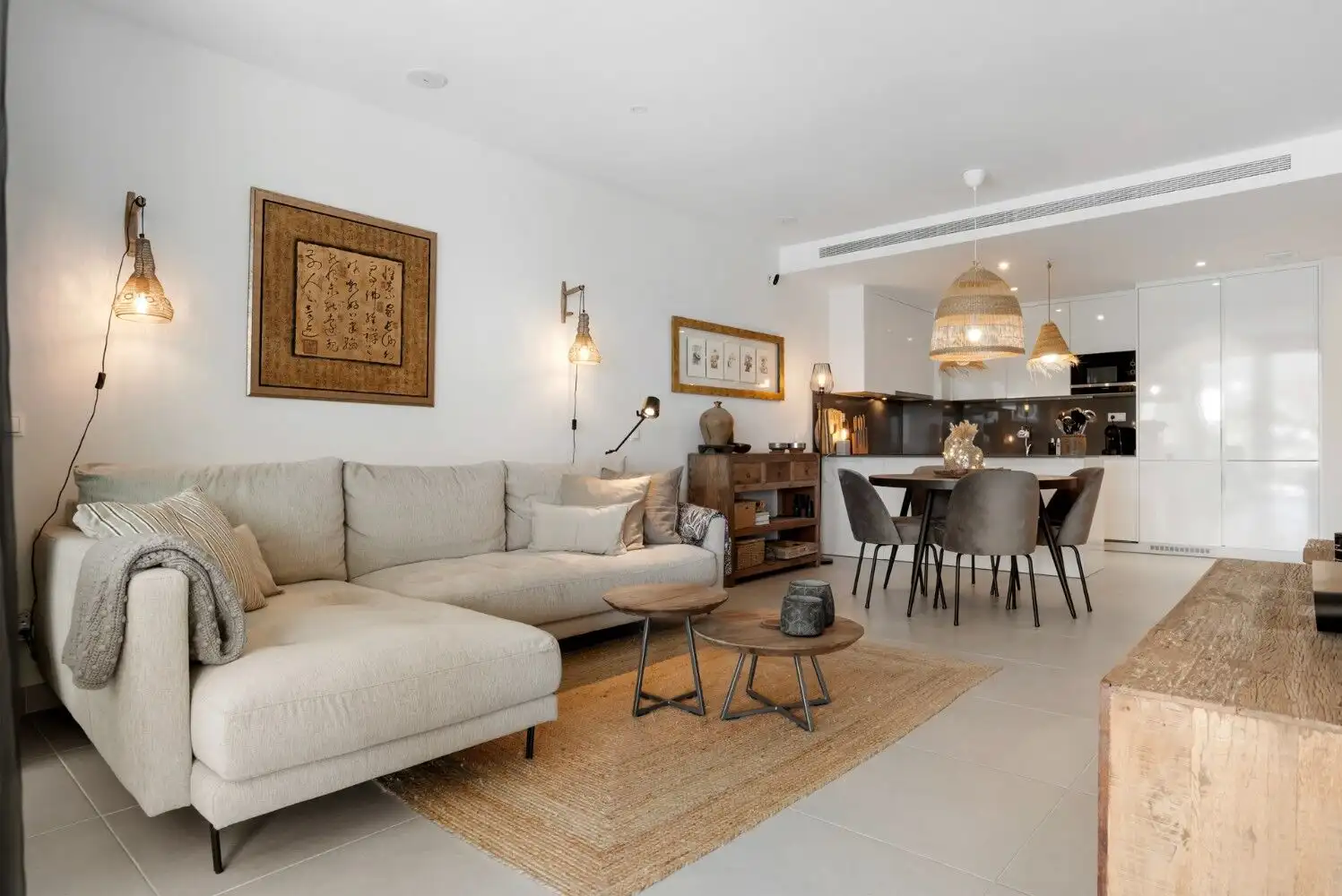 Floor apartment living room with stylish decor and open-plan kitchen.