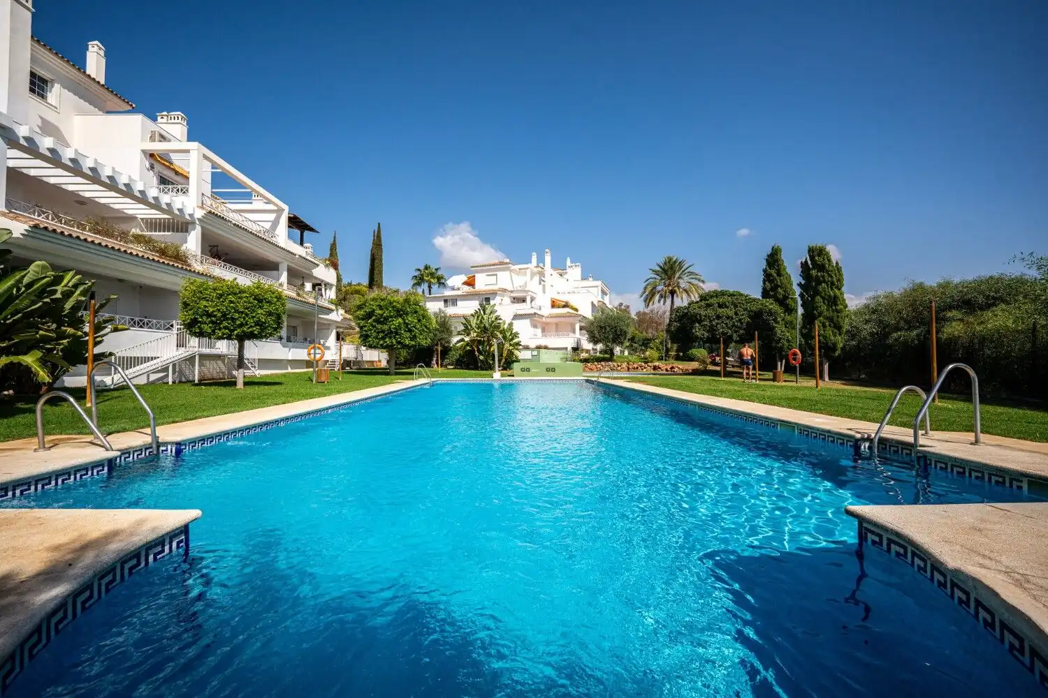 Luxurious apartment with modern design in Marbella East, featuring a private pool and lush gardens.