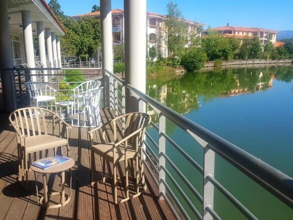 Balcony view of a lake from a 1-bed apartment in Le Petit Lac, Mandelieu La Napoule, Cannes.