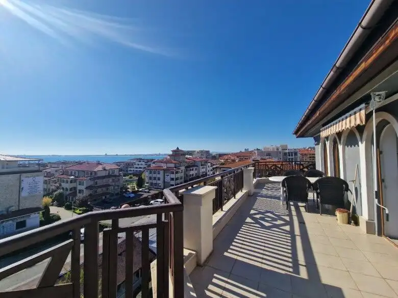 Sea view terrace with outdoor seating in Royal Palm, St. Vlas, offering stunning coastal vistas.