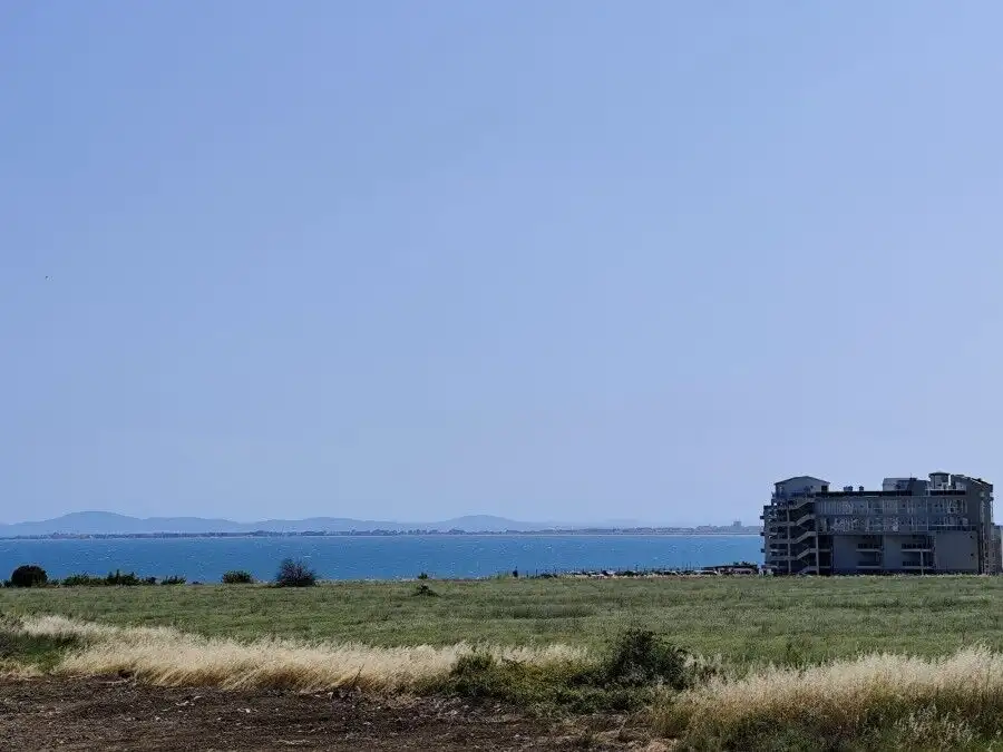 Sea view from SunSet Ravda apartment, 300m from the beach, with open sky and coastal landscape.