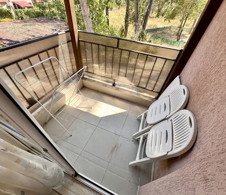 Comfortable balcony with pool views in Sunny Beach.
