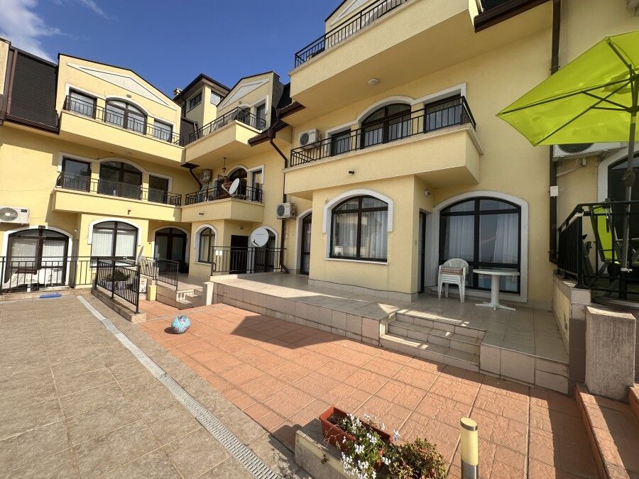 Bright 2-bedroom apartment with veranda and pool access in Nessebar View complex.