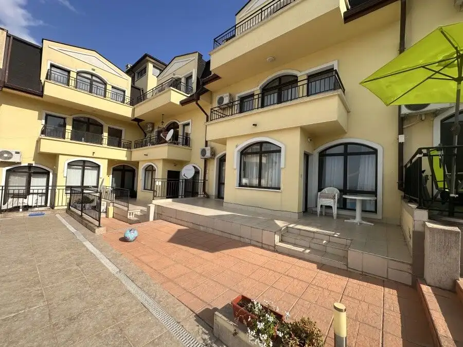 Bright 2-bedroom apartment with veranda and pool access in Nessebar View complex.