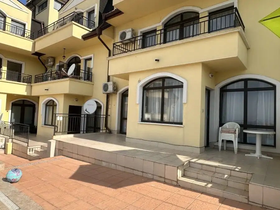 Bright 2-bedroom apartment with large veranda and direct pool access in Nessebar View complex.