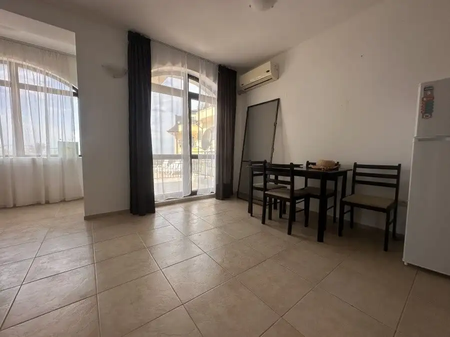 Bright 2-bedroom apartment with large veranda and direct pool access in Nessebar View complex.