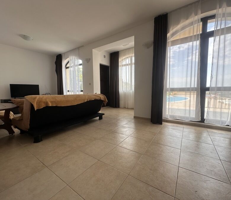 Bright 2-bedroom apartment with large veranda and direct pool access in Nessebar View complex.