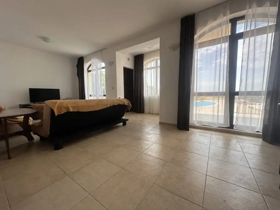 Bright 2-bedroom apartment with large veranda and direct pool access in Nessebar View complex.