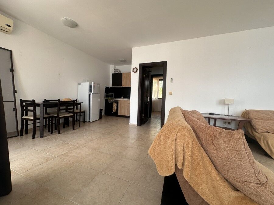 Bright 2-bedroom apartment with large veranda and direct pool access in Nessebar View complex.