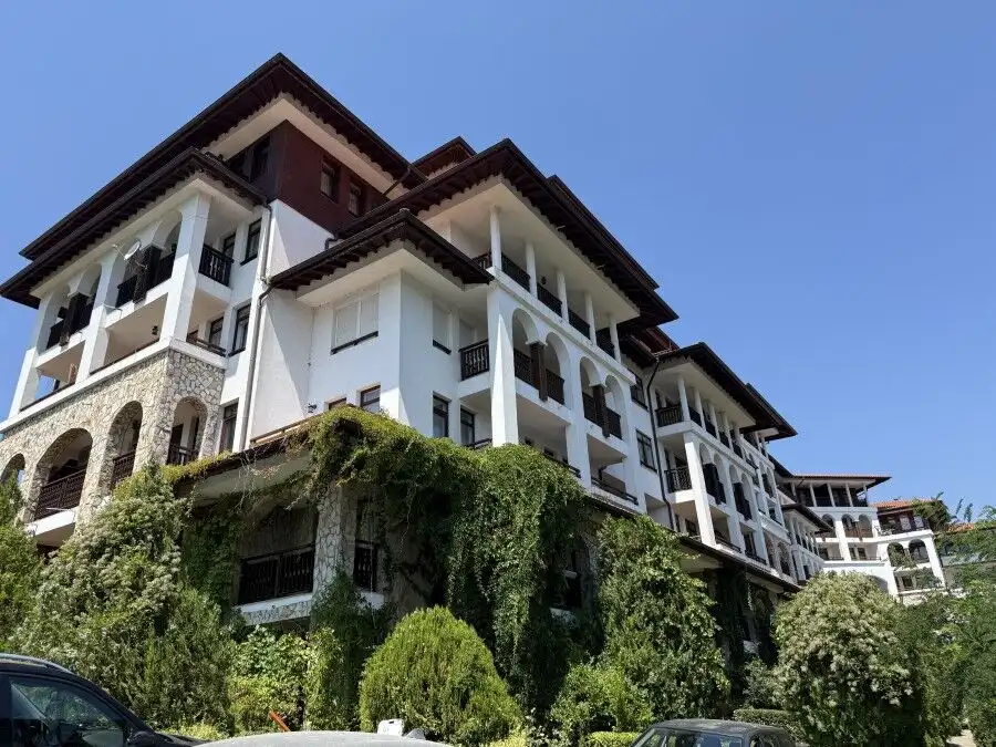 Modern apartment building in St. Vlas, Bulgaria, close to the sea with lush greenery and spacious ba.