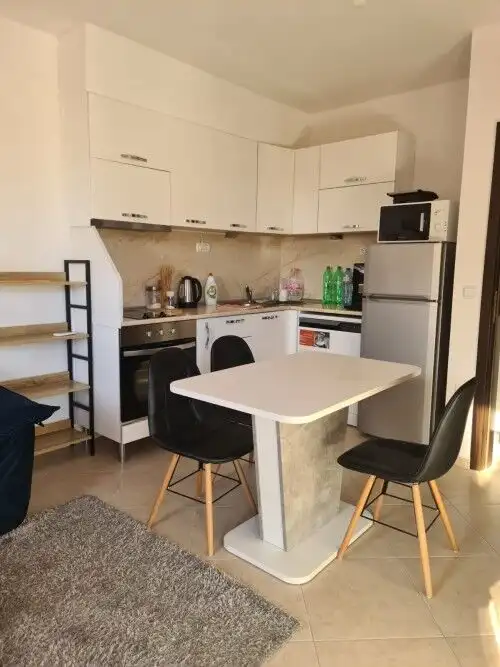 Furnished 2-bedroom apartment in Cascadas Family Resort, Sunny Beach, with modern kitchen and dining.