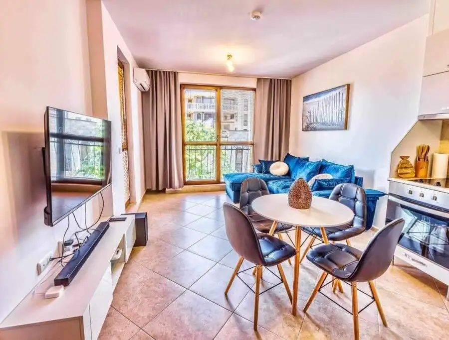 Bright 2-bedroom furnished apartment with living room, balcony, and modern amenities in Sunny Beach.