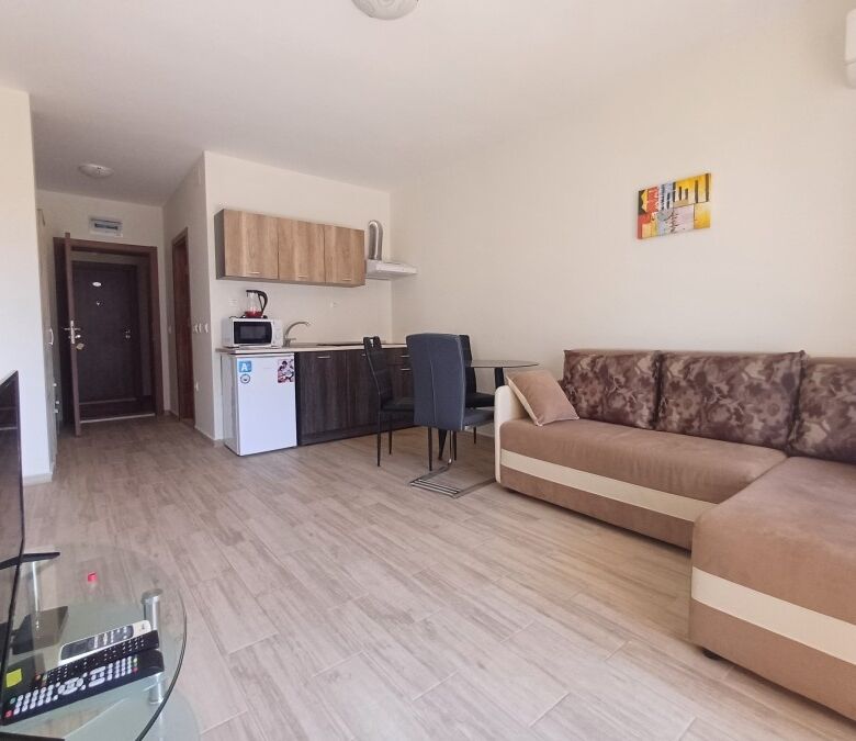 Spacious 36 sq.m. studio with park views, located in Cascadas Family Resort, featuring a living area.