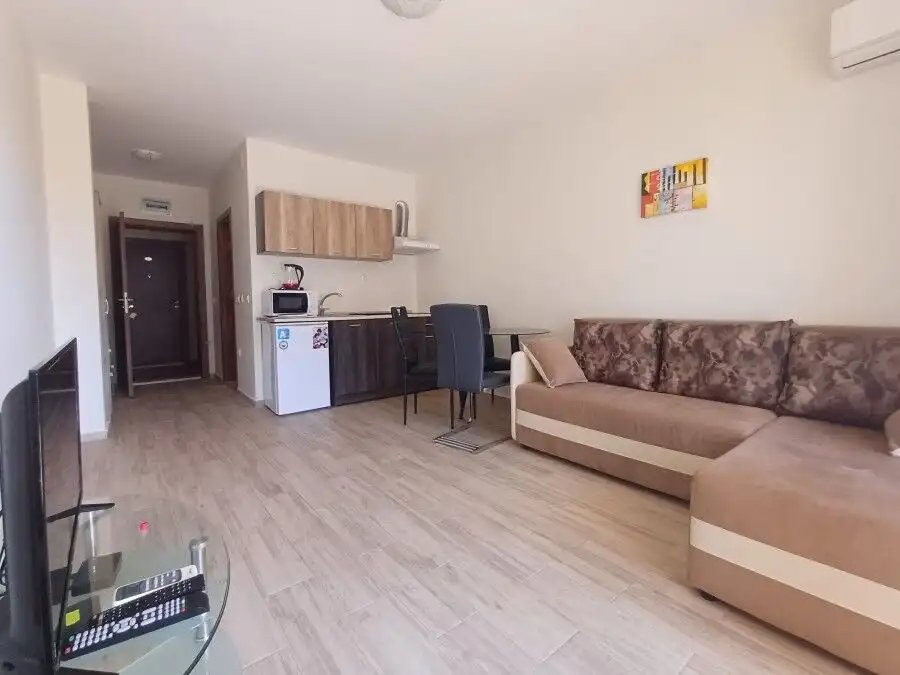 Spacious 36 sq.m. studio with park views, located in Cascadas Family Resort, featuring a living area.