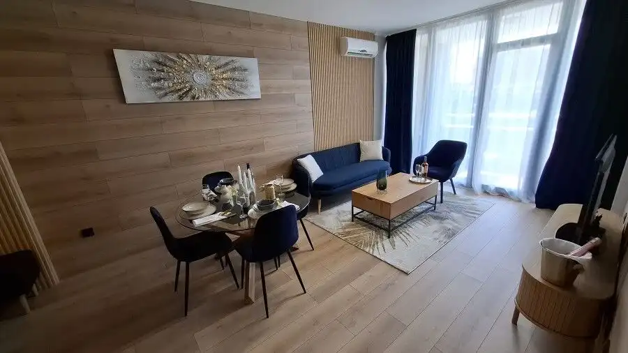 Modern living room with stylish furniture and large windows in Trakia Plaza.