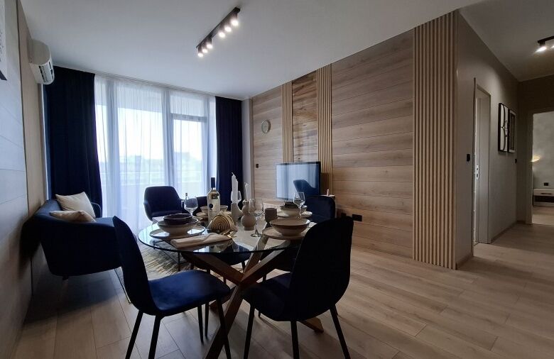 Bright living space with stylish furniture and natural light.
