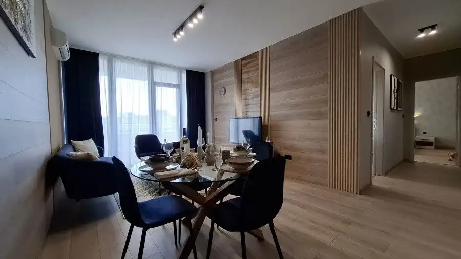 Bright living space with stylish furniture and natural light.