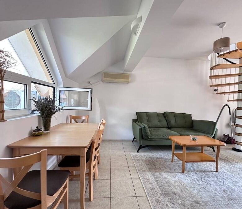 Bright living space with modern furnishings and large windows in Robinson Gardens, Sunny Beach.