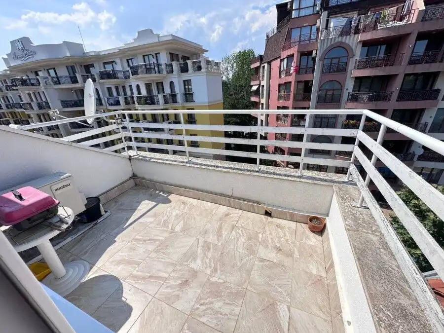 Bright balcony with city views in Robinson Gardens, Sunny Beach. Perfect for relaxing or entertainin.