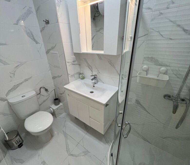 Seaside studio bathroom with modern fixtures in Valencia Gardens complex, Nessebar.