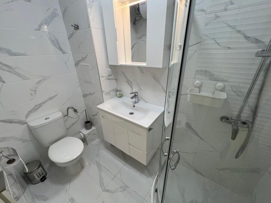 Seaside studio bathroom with modern fixtures in Valencia Gardens complex, Nessebar.
