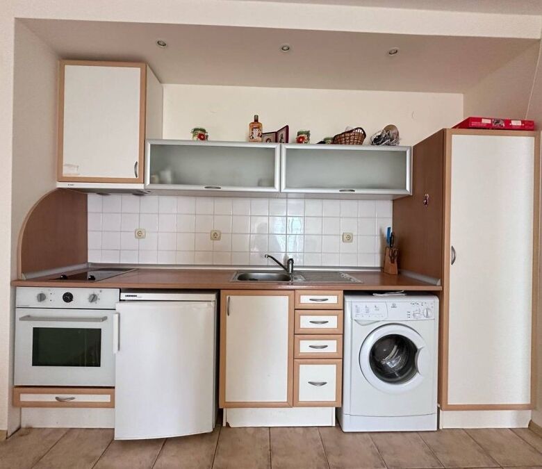 Modern kitchen with appliances in Coral Beach, St. Vlas apartment, sea view.