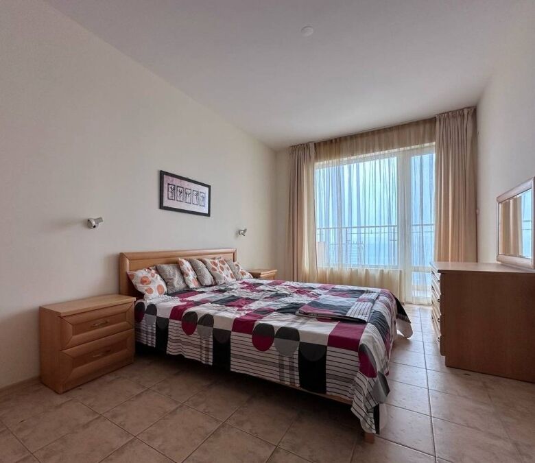 Sea view apartment in Coral Beach, St. Vlas with modern interior and spacious bedroom.