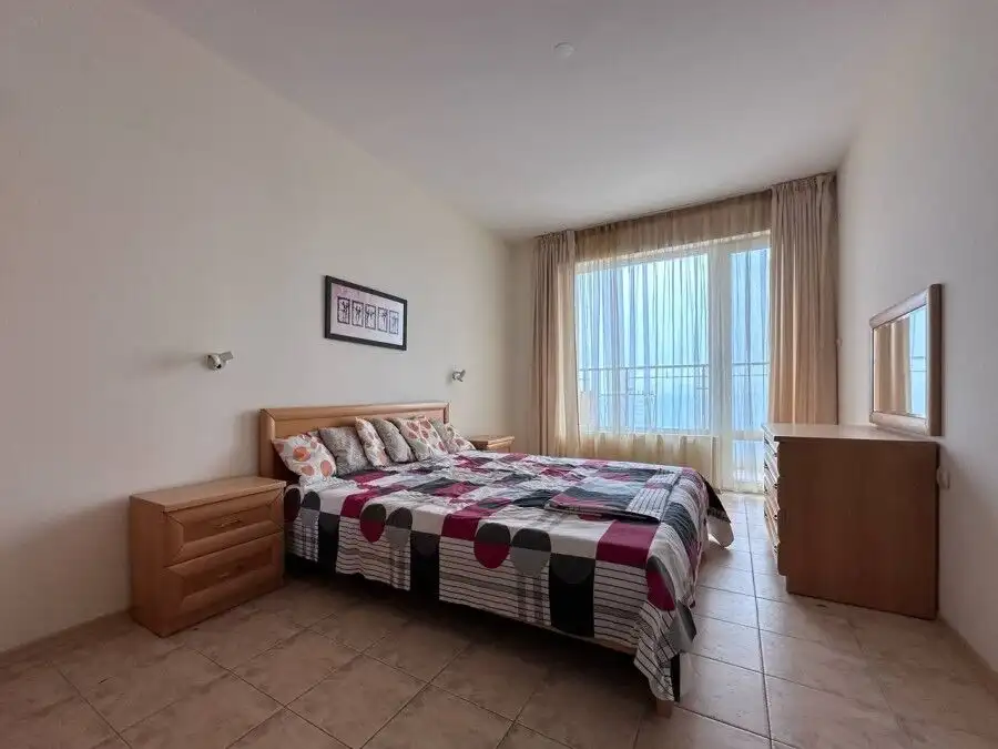 Sea view apartment in Coral Beach, St. Vlas with modern interior and spacious bedroom.