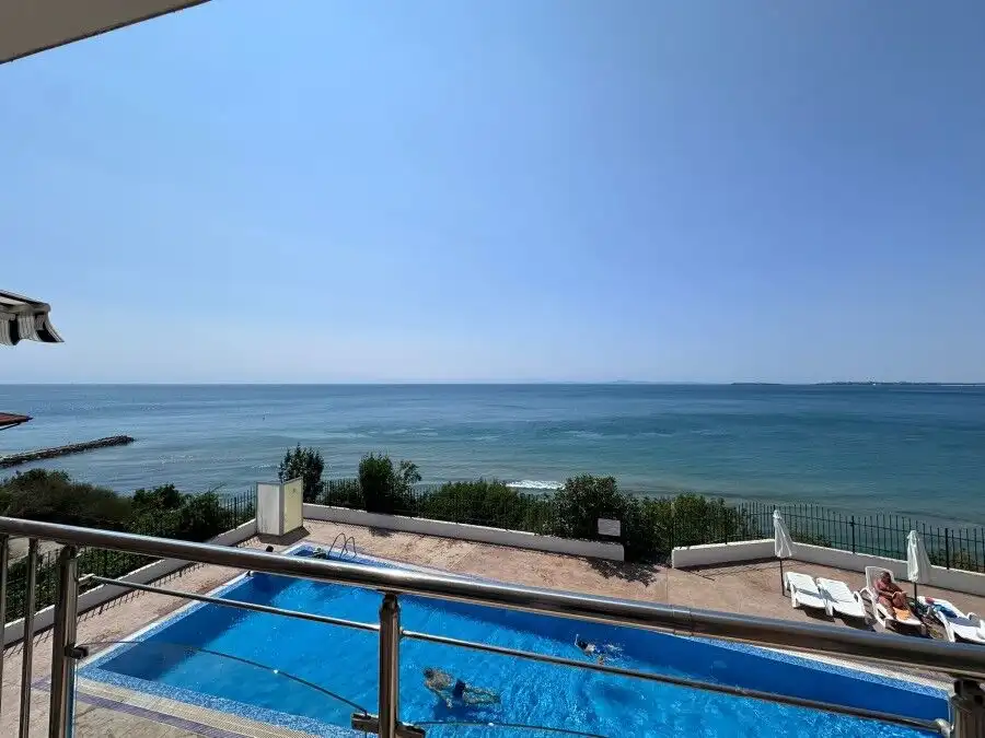 Sea front apartment with pool in Coral Beach, St. Vlas, offering stunning ocean views and modern ame.
