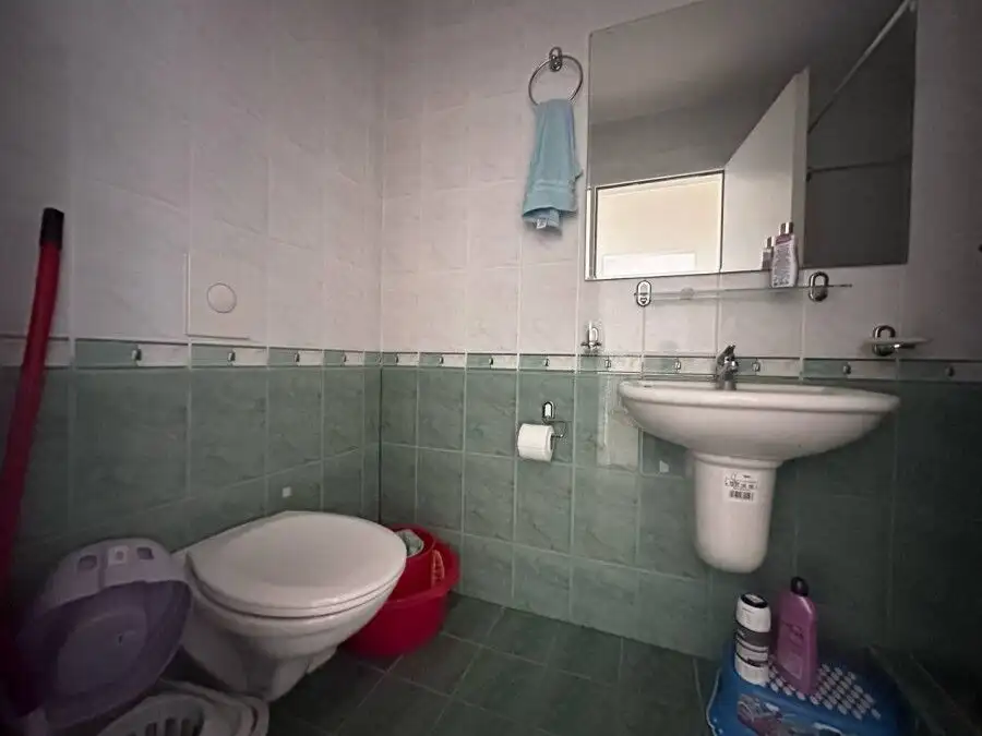 Small bathroom in a sea front apartment at Coral Beach, St. Vlas with modern fixtures.