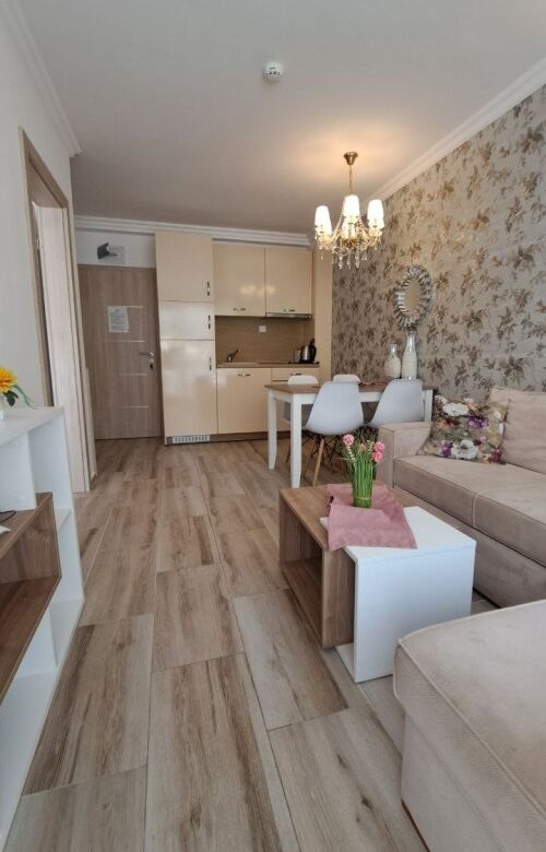 Bright 1-bedroom apartment in Sunny Beach with stylish decor and open-plan living area.