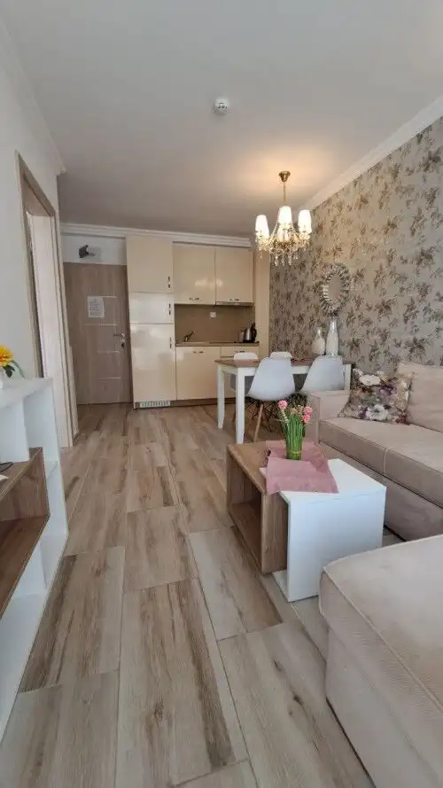 Bright 1-bedroom apartment in Sunny Beach with stylish decor and open-plan living area.