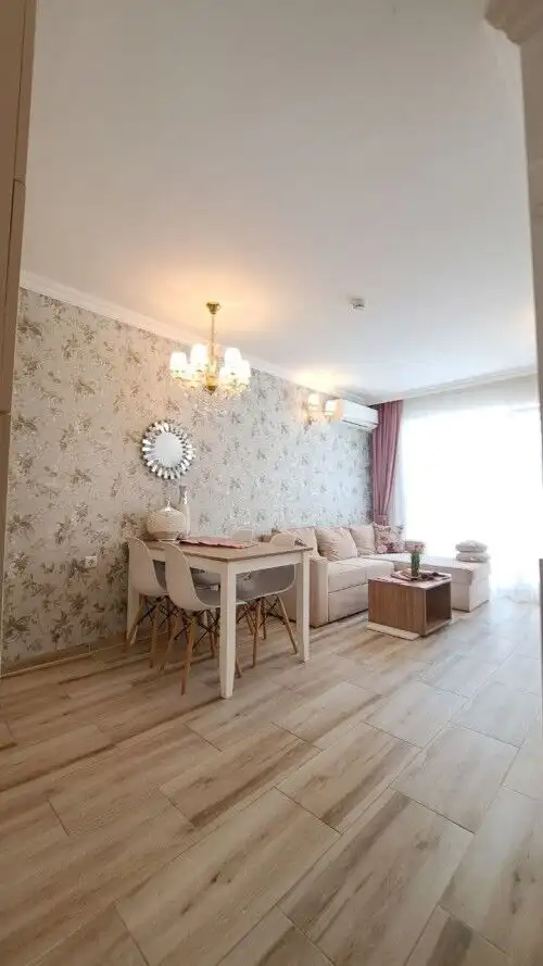 Bright 1-bedroom apartment in Sunny Beach with stylish decor and spacious living area.