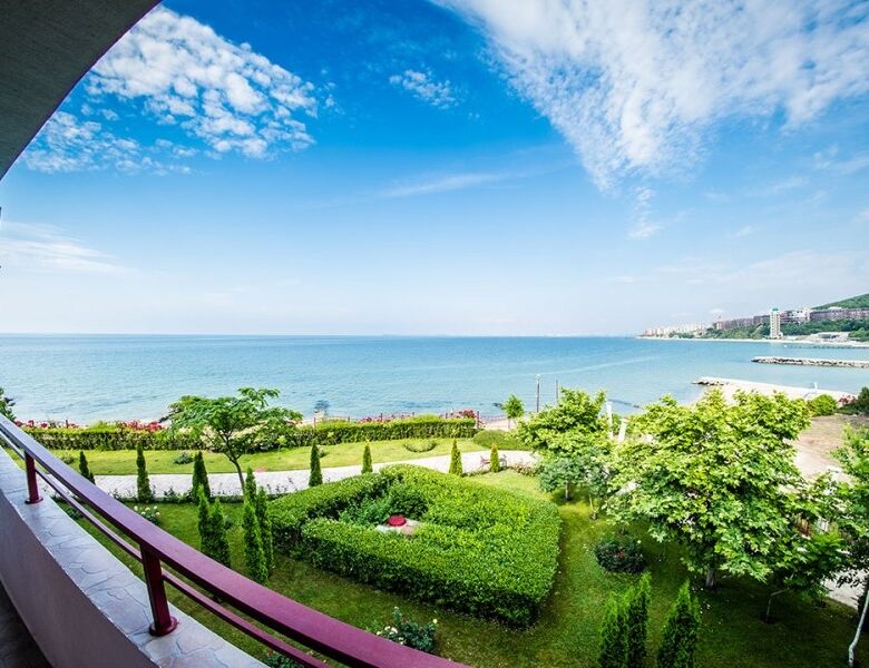 Sea view from balcony overlooking lush gardens and the Black Sea at Privilege Fort, Elenite Resort.