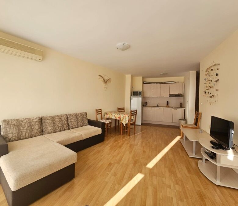 Spacious 1-bedroom apartment in Privilege Fort, Elenite Resort, with open-plan living area and moder.