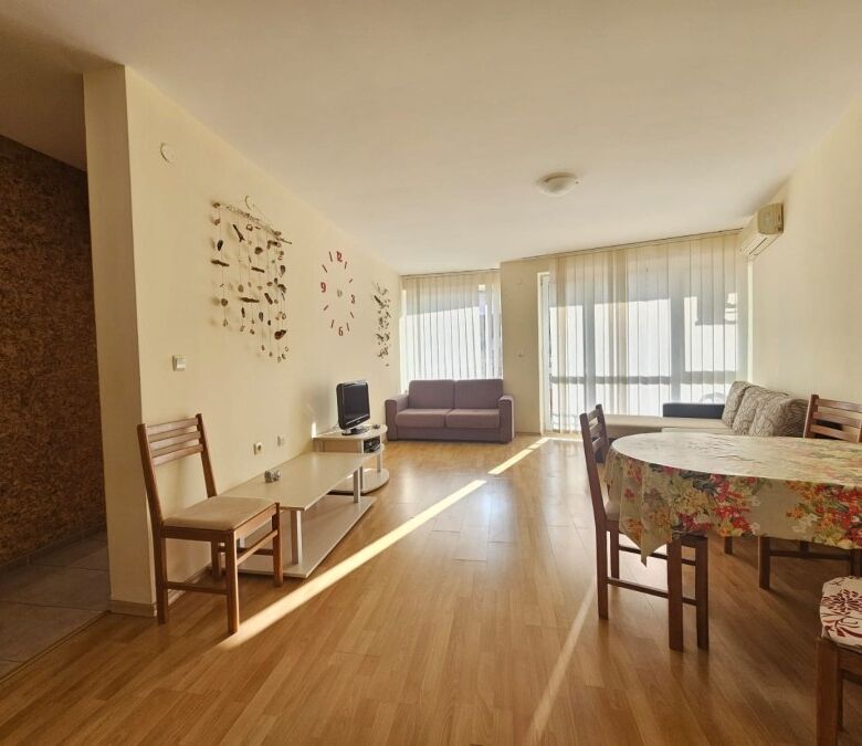 Bright living room with sea views and modern furnishings.