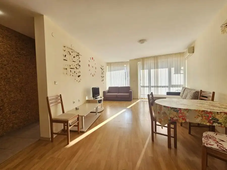 Bright living room with sea views and modern furnishings.